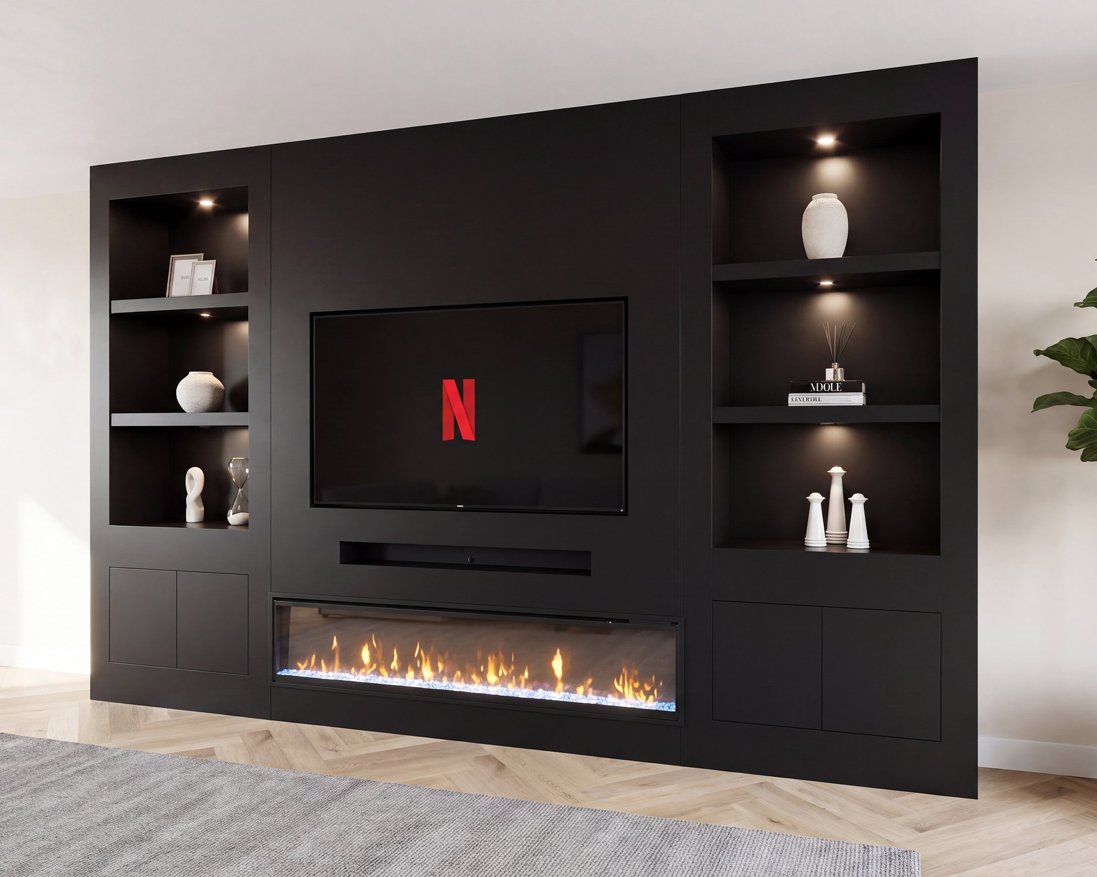 De volledige cinewall van plafond tot vloer, met beide nissenkasten, de televisie en de brandende vuurlijn